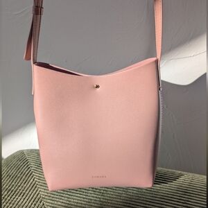 Samara Anthropologie Vegan Leather Pink Crossbody Bucket Bag with gold accent